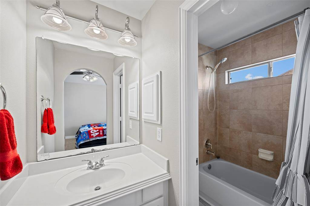 Here is one section of the jack-n-jill bath with private vanity and shared wet spaces!