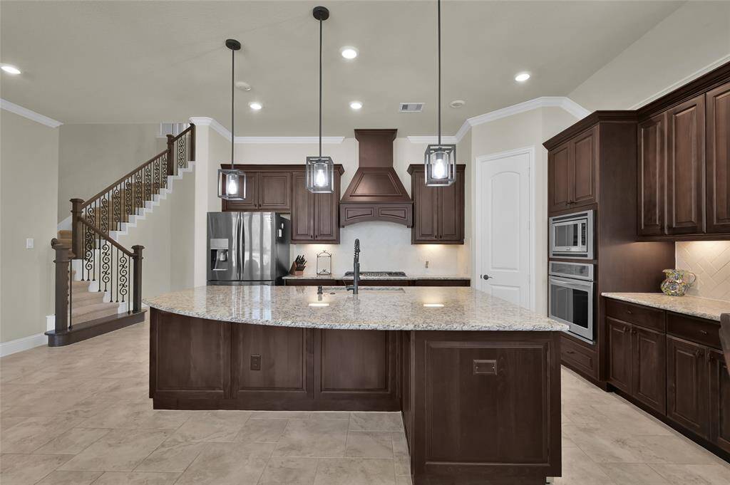 Truly the heart of the home! Enjoy all the massiveness and elegance this space allows!