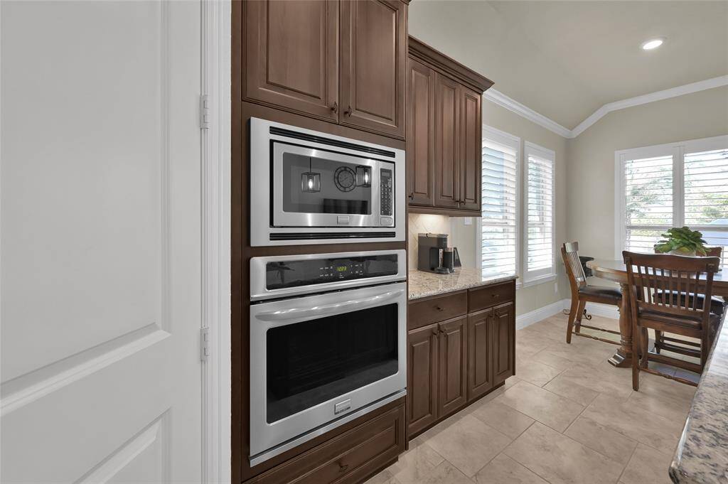 All stainless appliances, wine fridge, under-mount cabinet lighting, granite counters, composite granite sink are just a few of the many features of this stunning kitchen area.