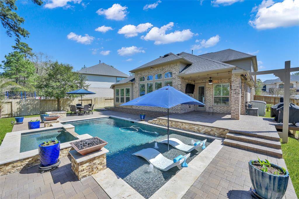YES! Just in time for summer THIS stunning custom built pool is waiting for you too!