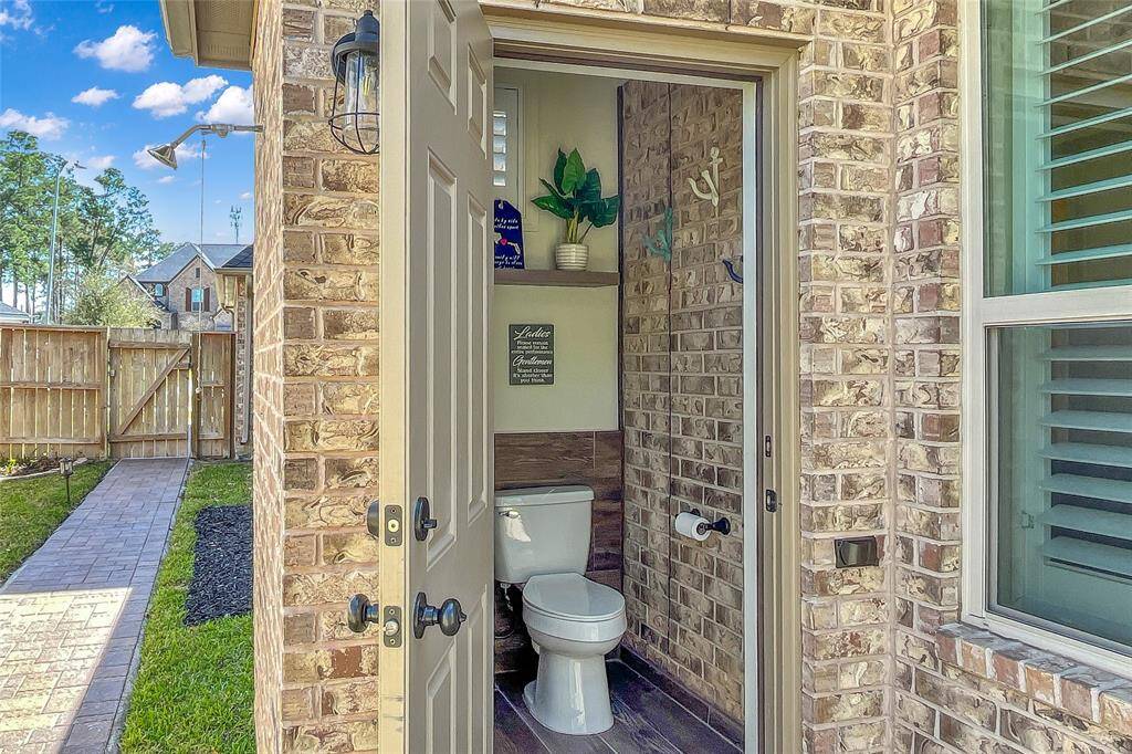 Notice how immaculate every detail is with this home. Pool half bath and a exterior shower to rinse too!  You are truly going to love how immaculate everything is in this home!