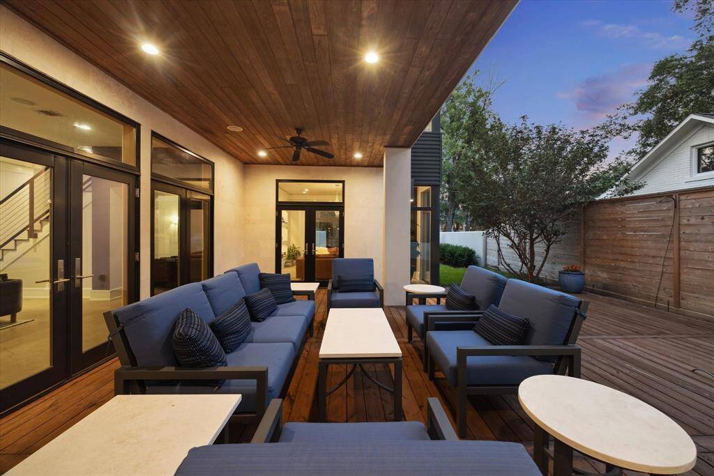 The covered loggia is 12' deep x 27' wide, with ceiling fans and plenty of room for comfortable seating.