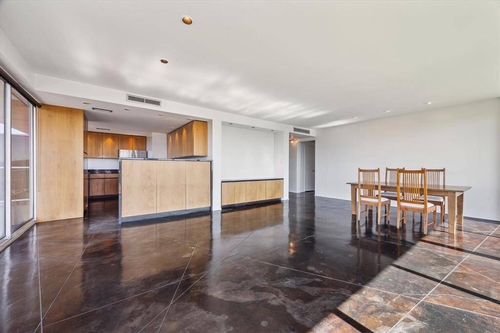 The well-appointed kitchen is a pleasure to work in. The wood cabinetry provides both a warm feel and abundant storage.