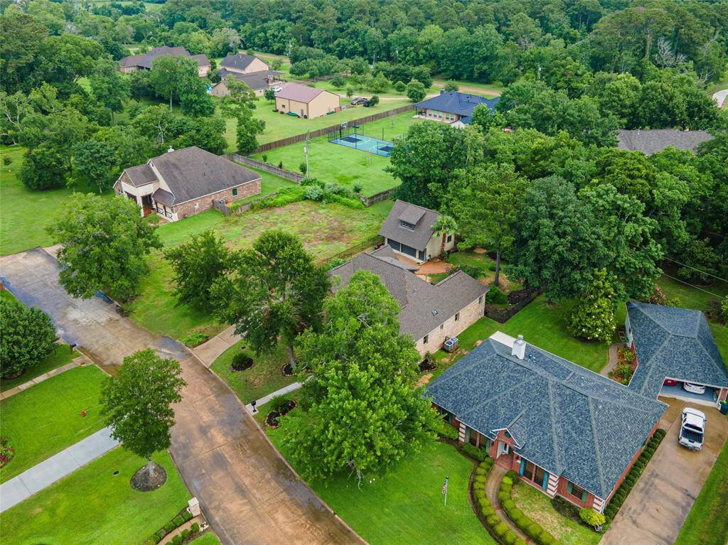 Home is located in wooded area on private dead-end street.