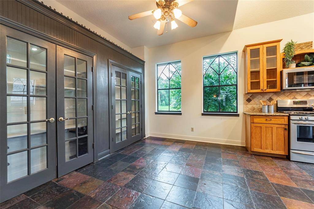 Another view of the breakfast area with amble pantry storage space.