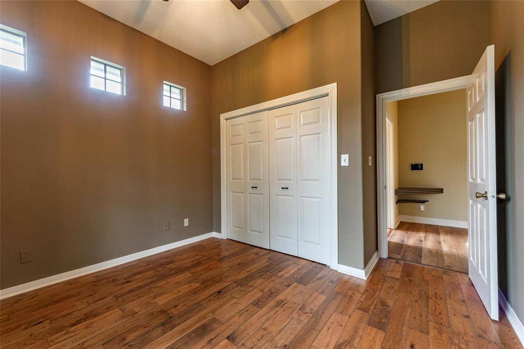 Double door closet space in this secondary bedroom on first floor.