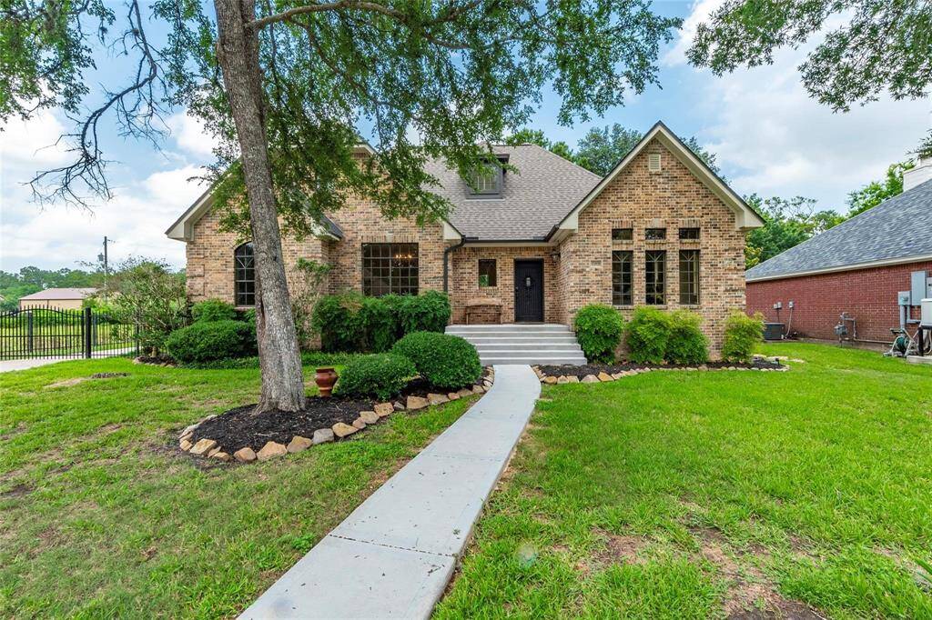 Beautiful cottage home with 3 bedroom 3 full baths and oversized 2 car detached garage.