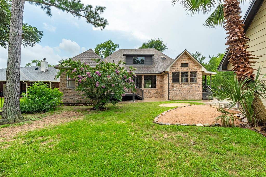 Back view of this gorgeous custom home; bricked on all 4 sides.
