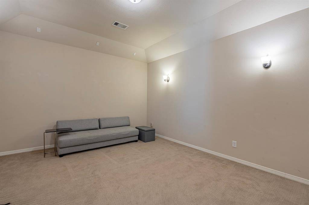 This media room is located just off the game room.
