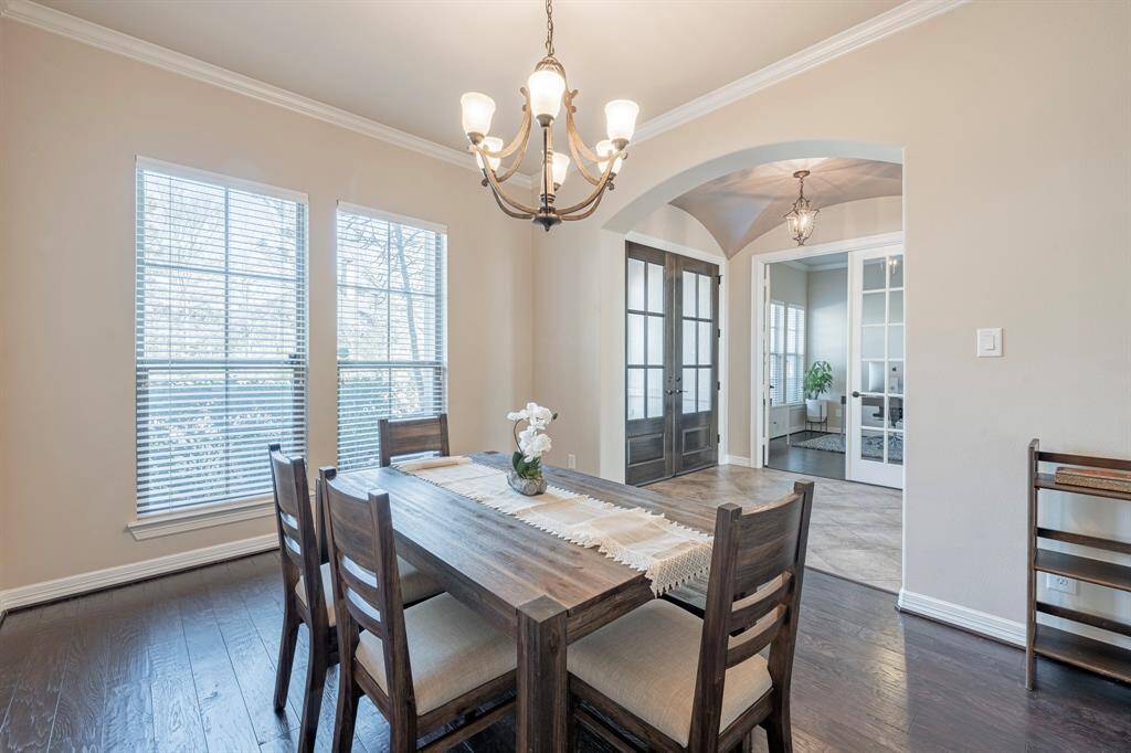 Enjoy elegant dining and large dinner parties. Stunning formal dining room with beautiful hardwood floors and easy access to the Kitchen