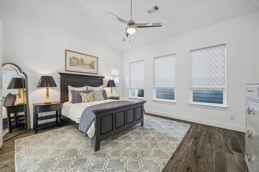 The large primary is located on the 3rd floor and has soaring ceilings like the rest of the home.