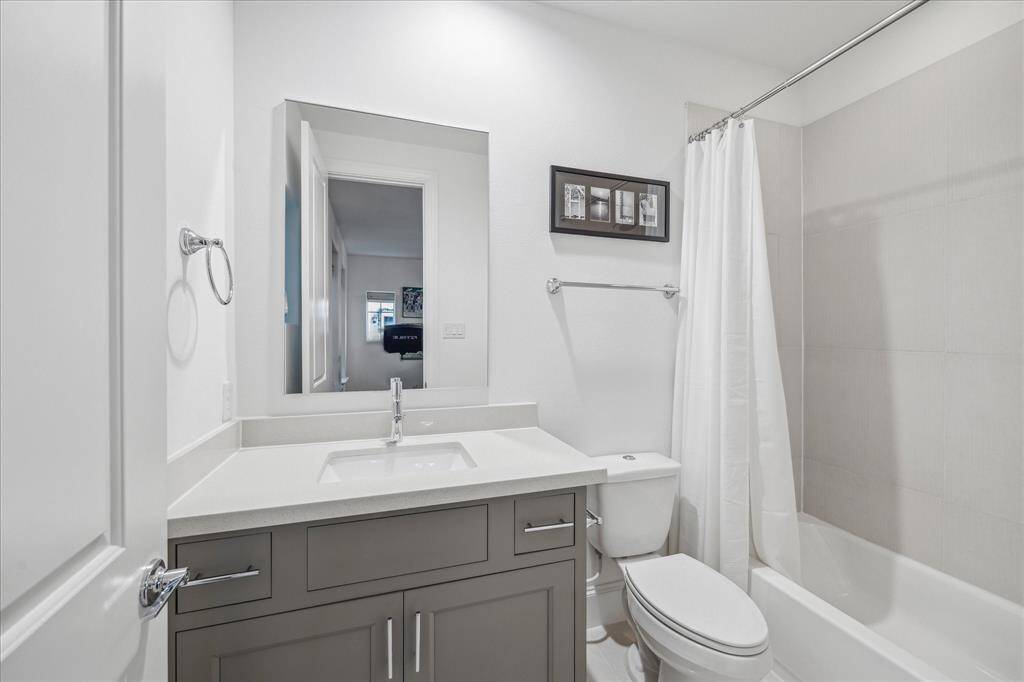 Ensuite bathroom located on the first floor.
