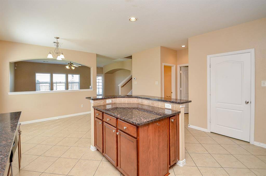 Effortlessly manage laundry with convenient washer and dryer hookups in this dedicated space.