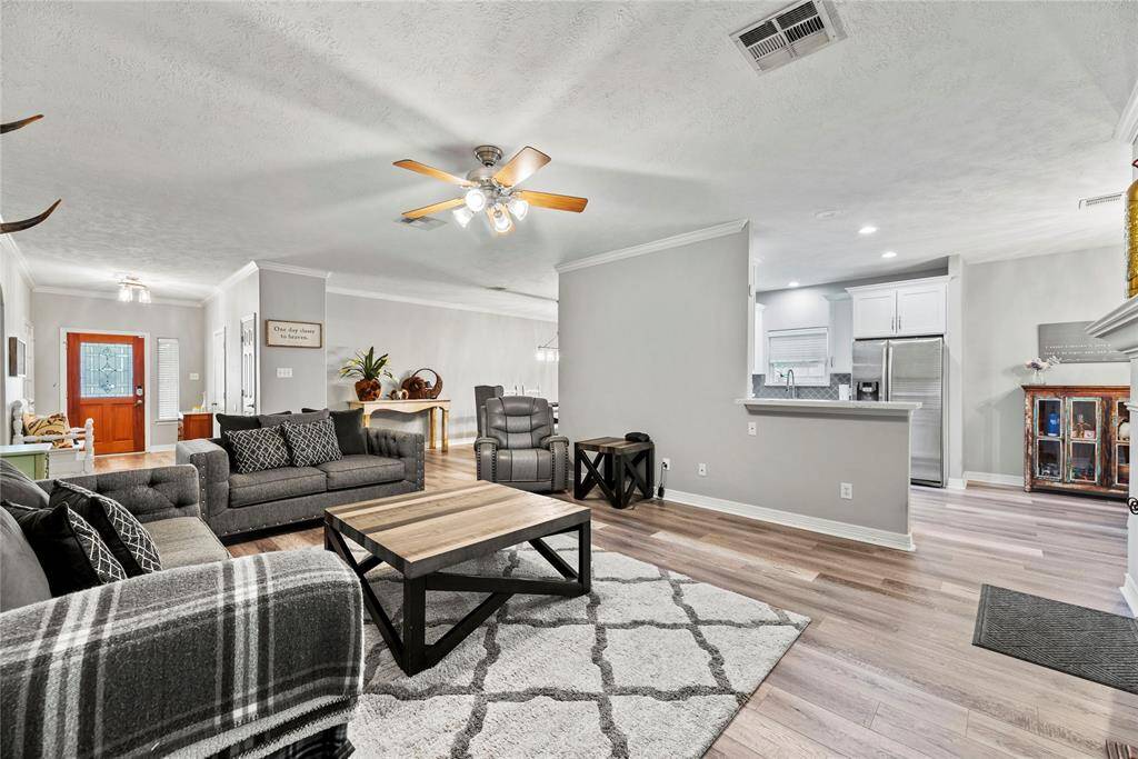 Snuggle up for a family movie night or gather friends for the big game, this room is sure to become the heart of your home.