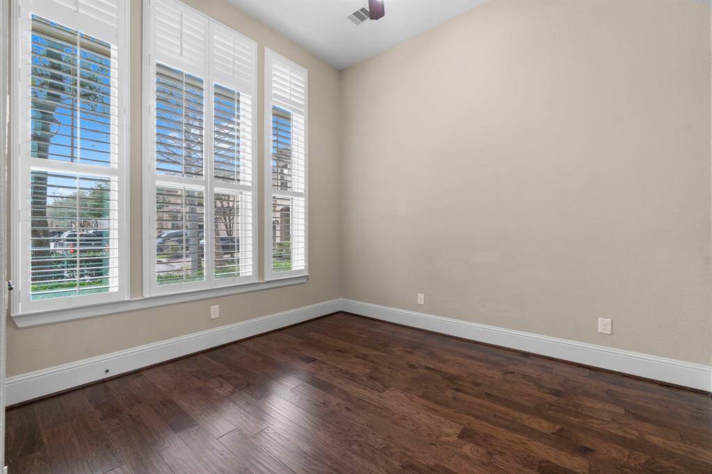 Secondary bedroom on first floor with plantation shutters