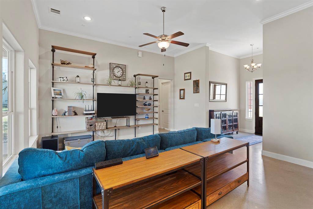 High ceilings, neutral paint, and recessed LED lighting create light and airy living spaces.