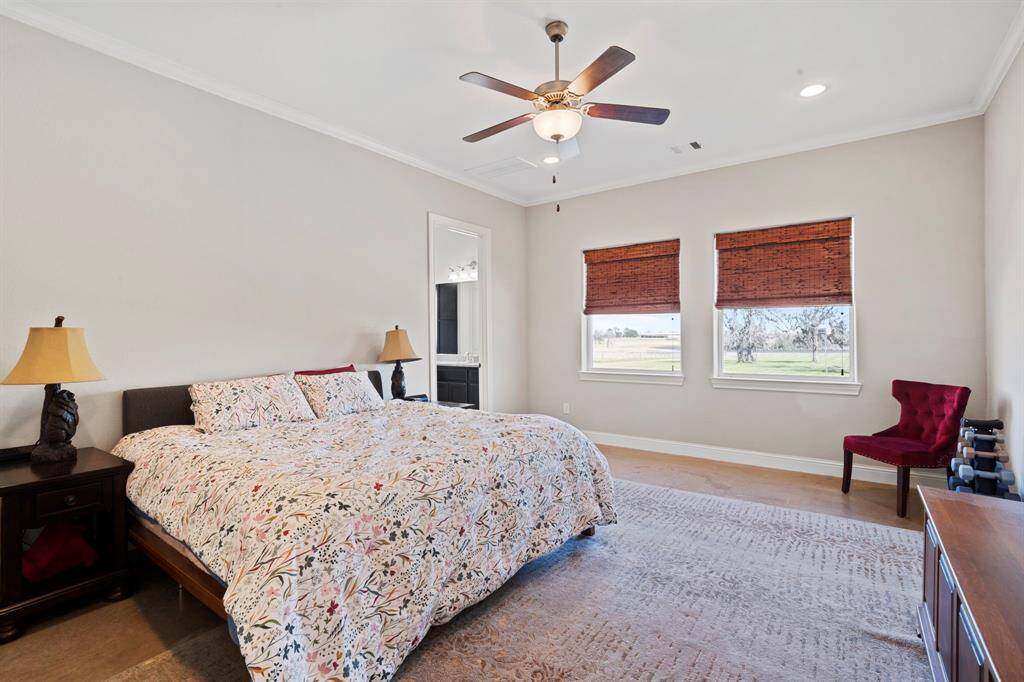 The large primary suite is a true sanctuary with ample room for a private sitting area.
