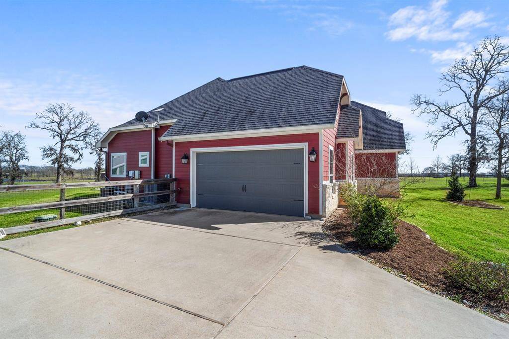 A 2-car attached garage offers convenience, security, and increased property value by providing shelter for two vehicles, extra storage space, and easy access to the home, even in bad weather.