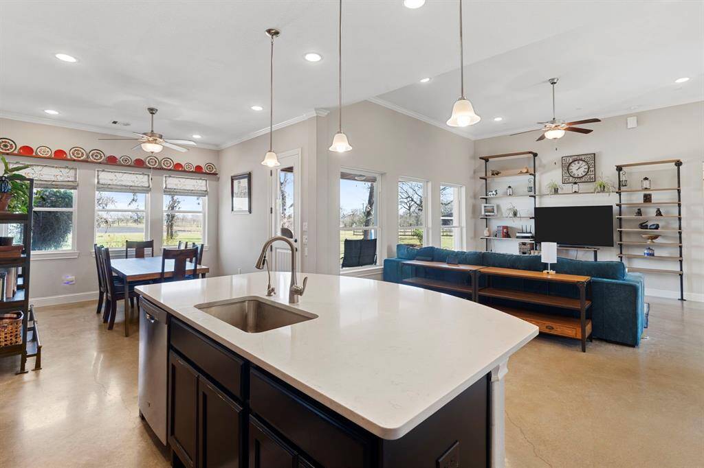 A perfectly positioned center island allows the chef to interact with family and guests while preparing meals.