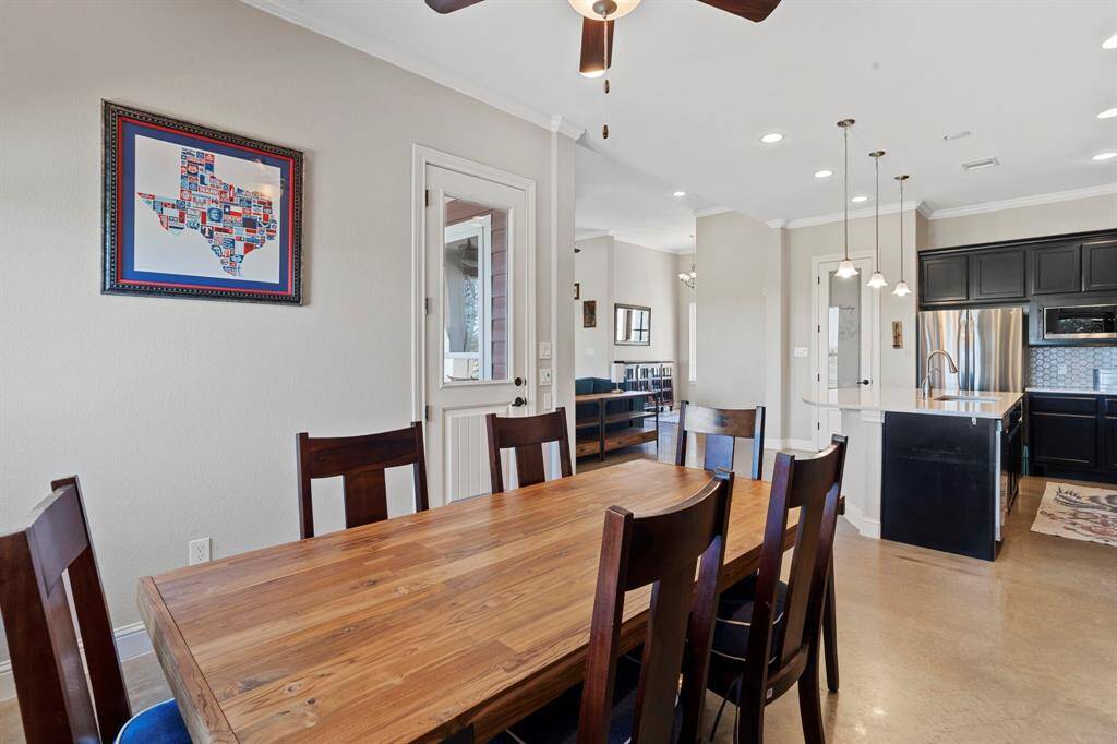 The open dining area is conveniently situated adjacent to the kitchen.