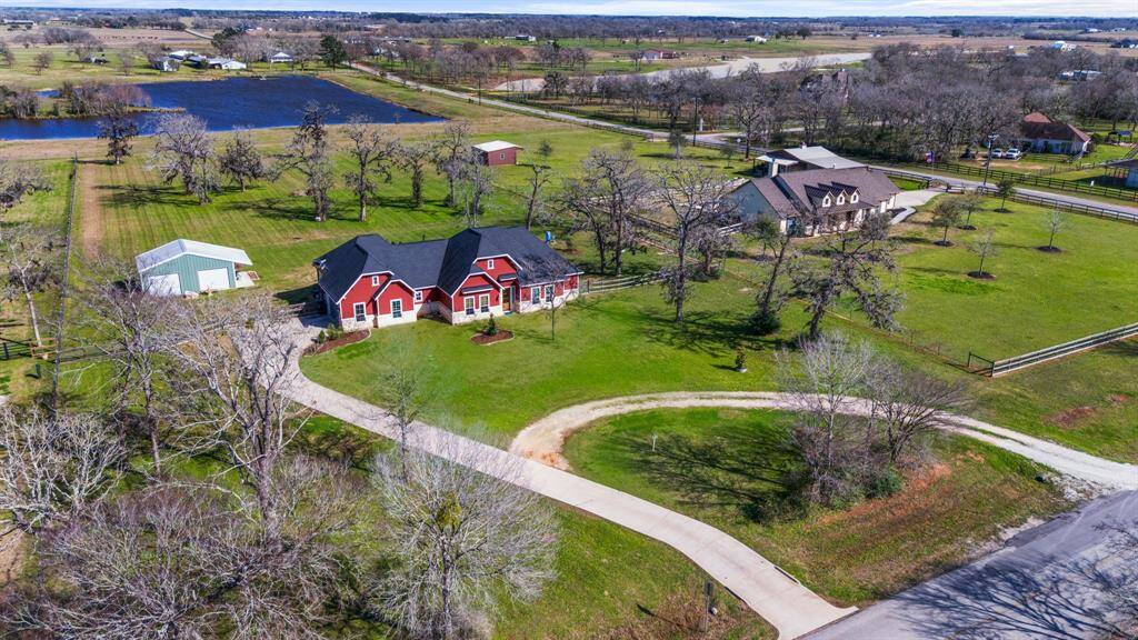 Situated on 3 acres of lush land, this charming home offers the perfect blend of privacy and modern comfort.