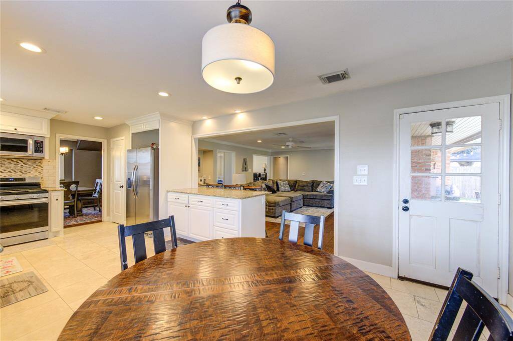 Breakfast room towards the kitchen and family room.