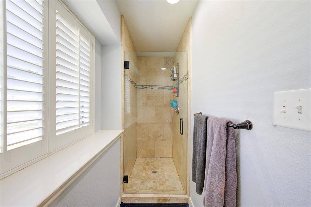 Primary bathroom walk-in shower.