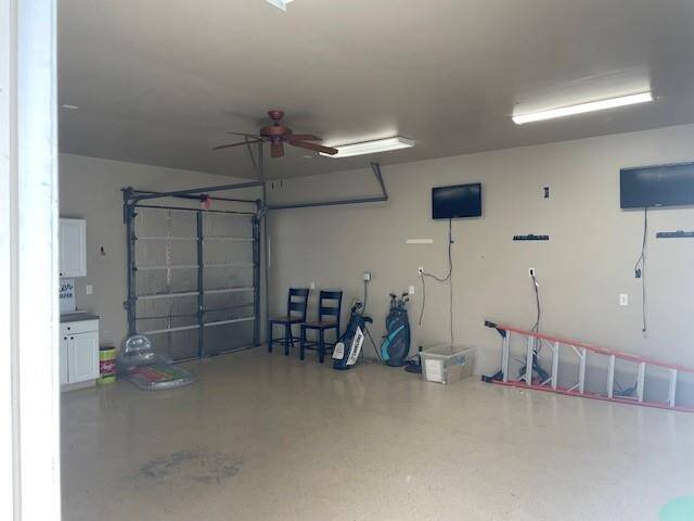 This is the interior of the workshop. It has electricity, and could be used as a home gym, hobby room, storage or more. It could also be converted into a mother-in-law suite.