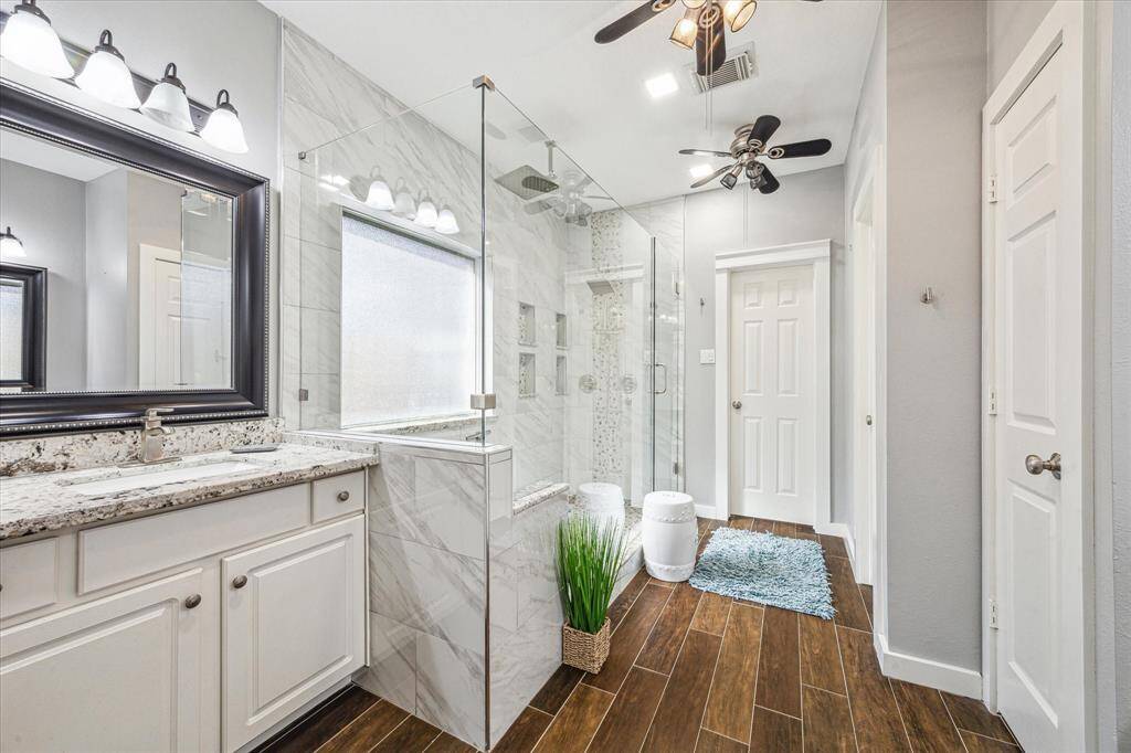 Completely renovated primary bathroom with huge modern shower