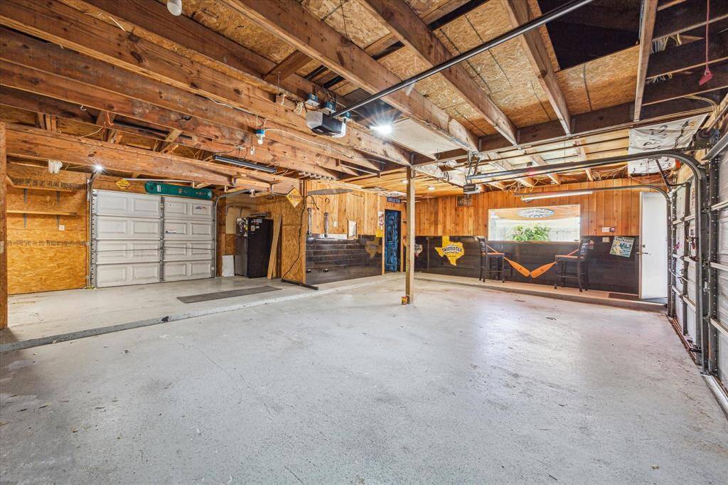 Look at the size of this three-car garage!