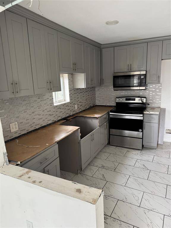 FRONT KITCHEN/ NO COUNTERTOPS