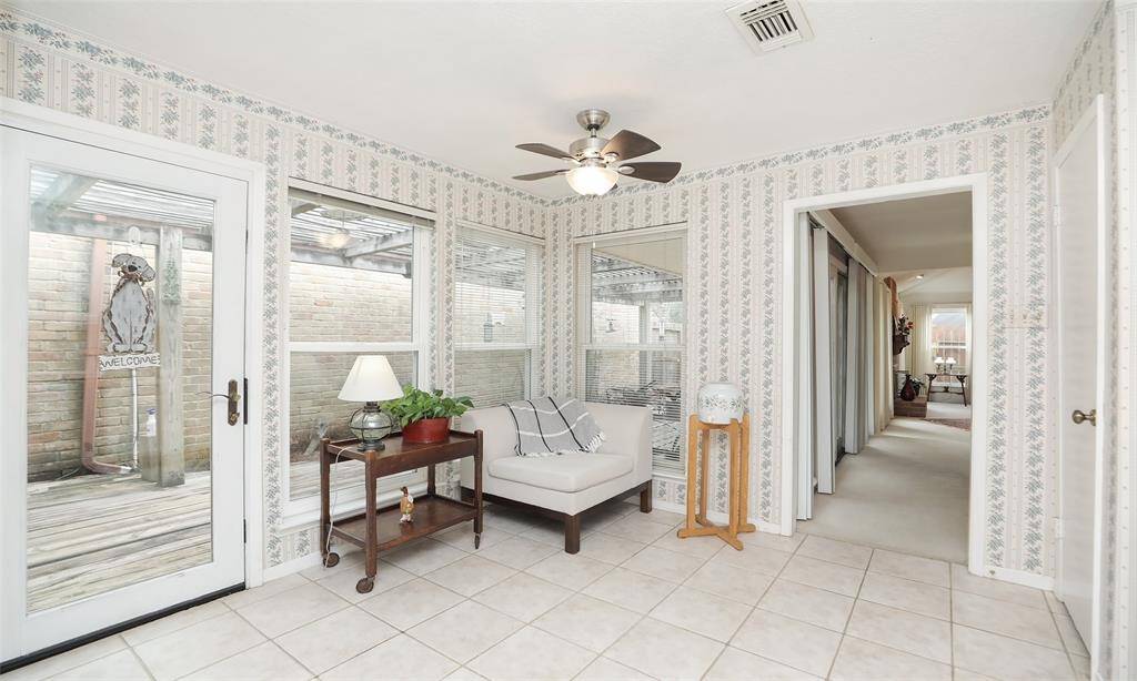 Breakfast area is perfect for a cozy table and chairs or just a sitting area that looks out onto the deck. Lots of windows and a glass door that leads to the deck.