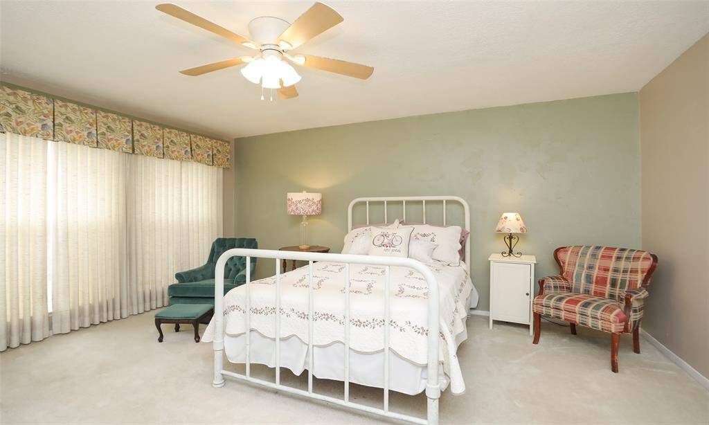 Another view of the primary bedroom