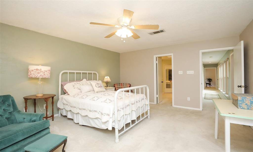 Primary bedroom is located at the back of the house.
