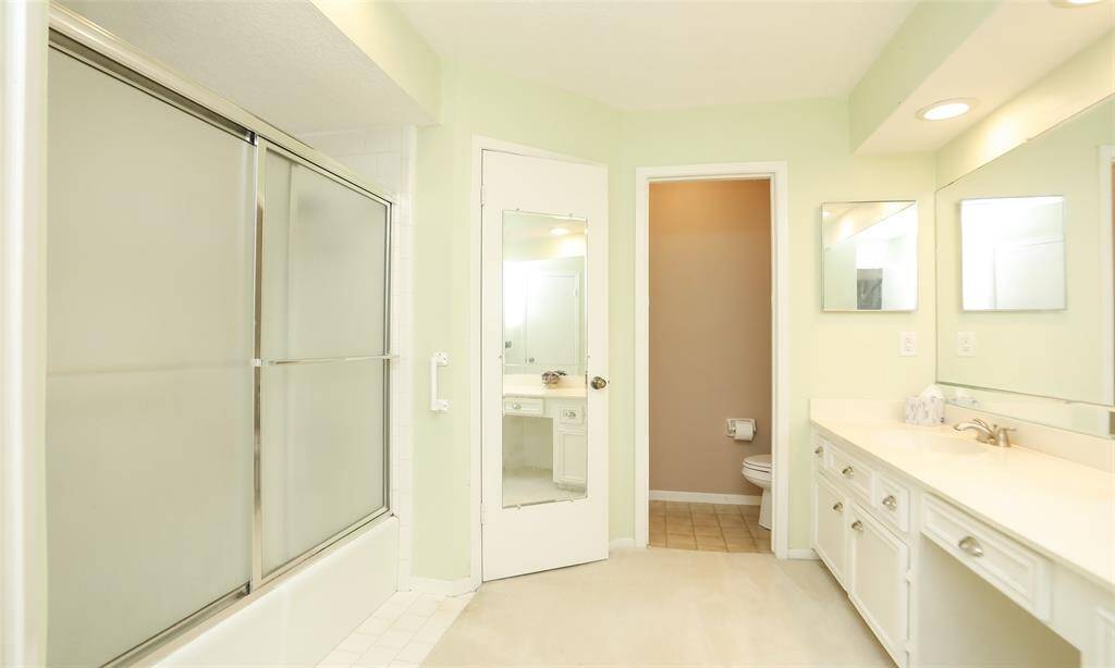 Primary bath has a shower bath combo for ease.  Also has a separate water closet for privacy.
