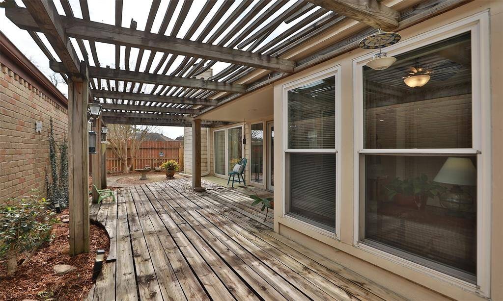Lovely deck located on the side of the house from the dining room and kitchen.