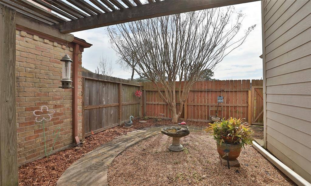 Continuing from the deck to the back yard.  The gate from the backyard leads to the greenbelt.