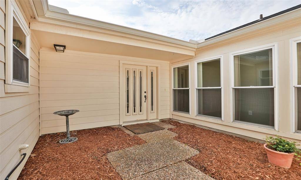 Private courtyard leads to the front entrance