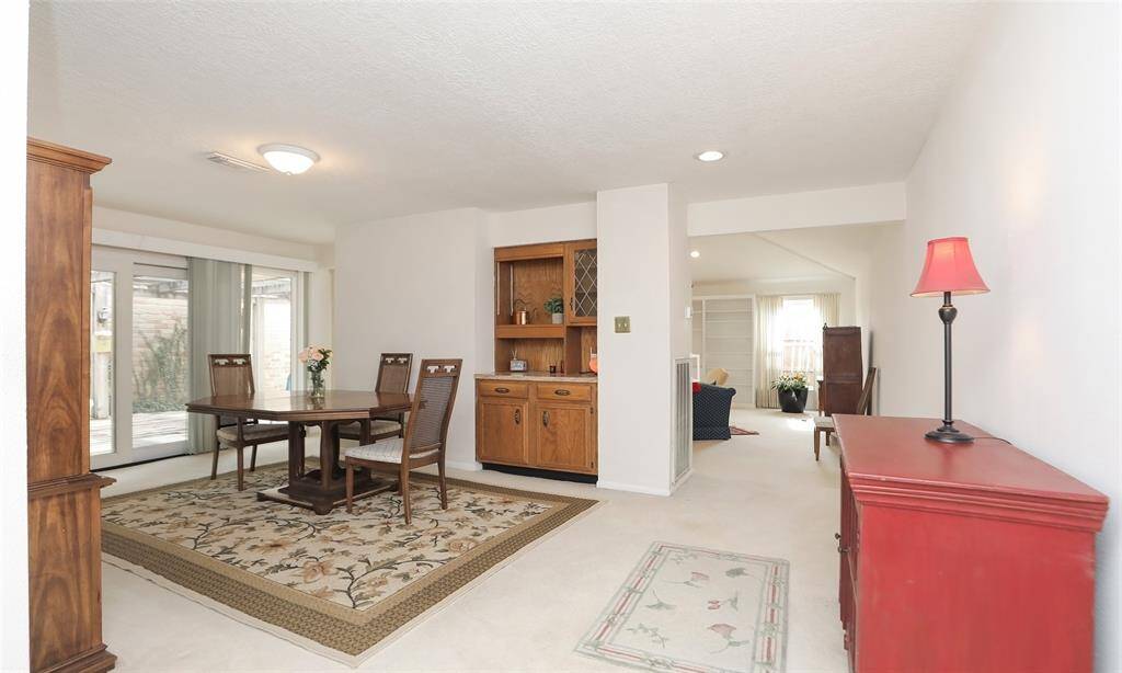 Front entrance views of the dining room and living roome