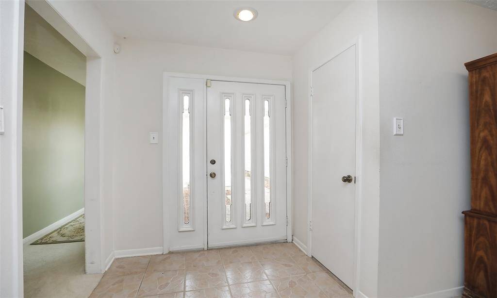 View of the front entry from inside the home