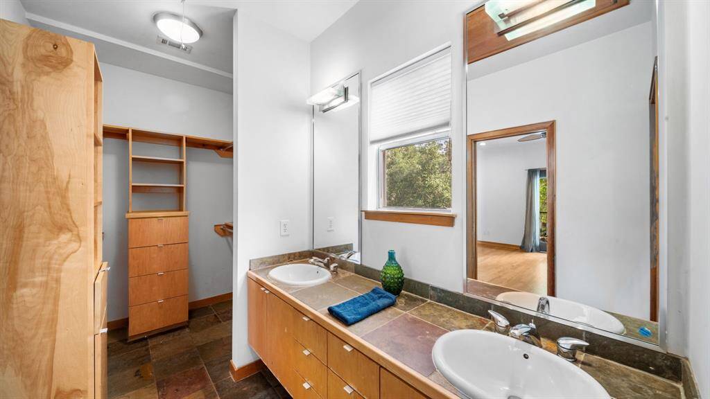 Walk-in closet with built in laundry hamper