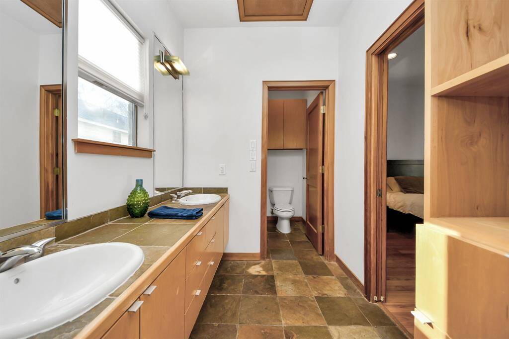 View of shower/tub toilet area from closet