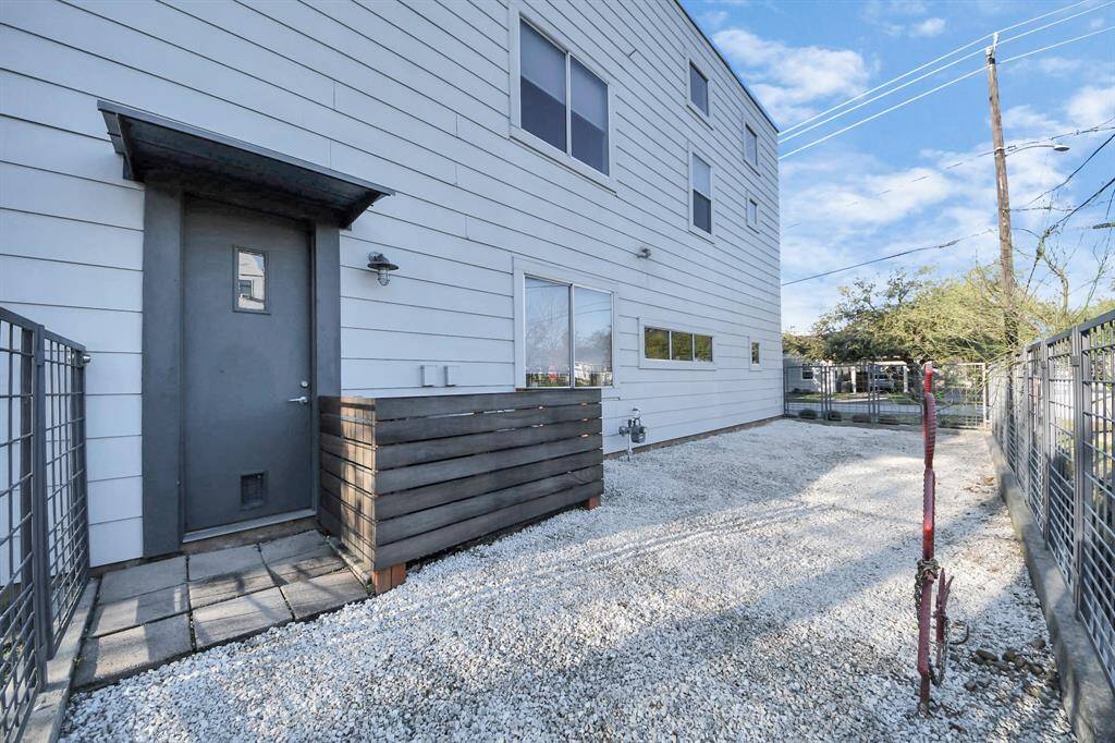 Fully fenced side yard can be accessed from a gate or the first floor office and seen from large kitchen window.