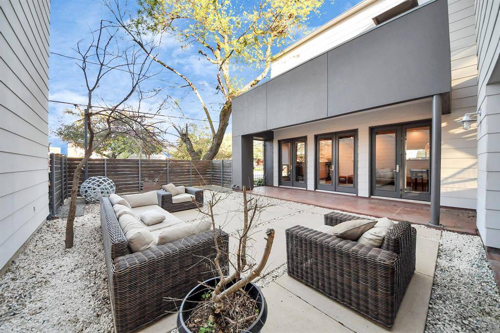 Additional shade from included sail, will cover the courtyard while looking out at the front of the home from the gated entry