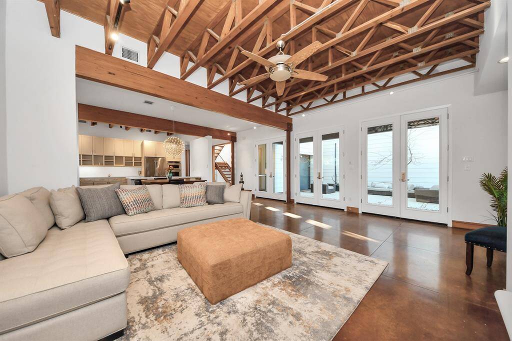 Welcome inside this incredibly designed home with stained concrete floors downstairs.