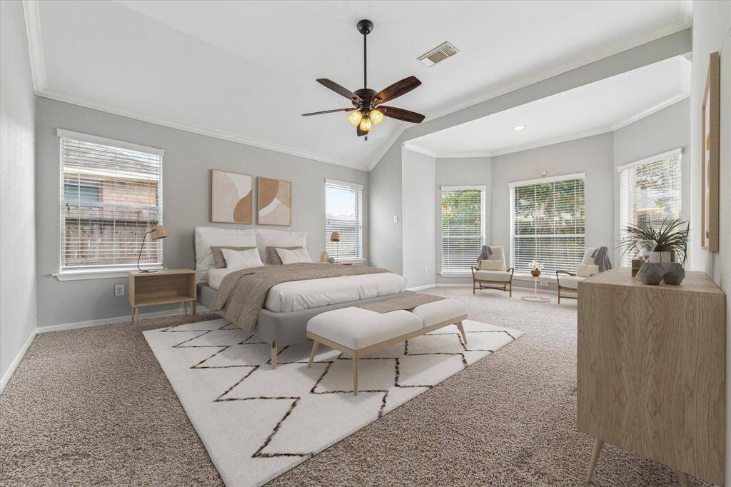 The Primary Bedroom is large enough to accommodate grand furniture, has 5 windows flooding the room with light, high ceilings & a huge walk in closet. Virtually staged.