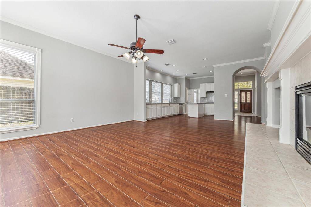 This view shows the expansive openness of the home from the corner of the Living Room. Don't miss a second of action!
