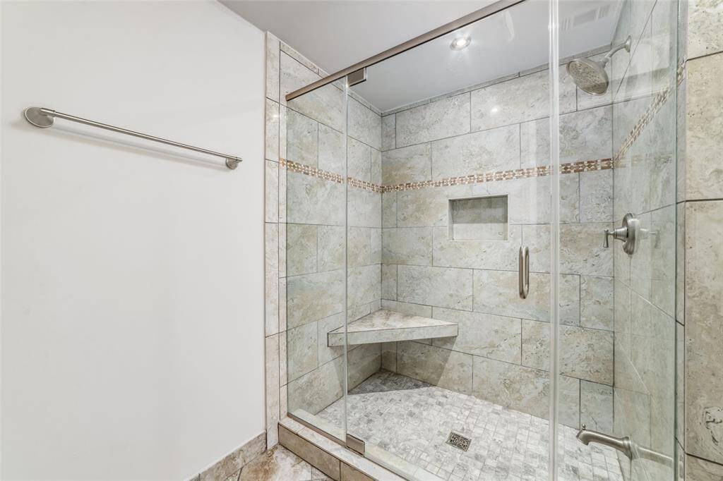 Modernized and convenient glass-wall shower.