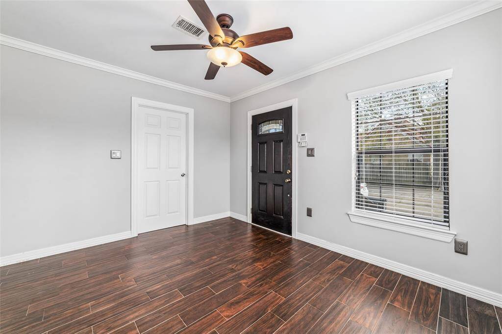 This space located in the rear of the house can be used as office/study or another bedroom.