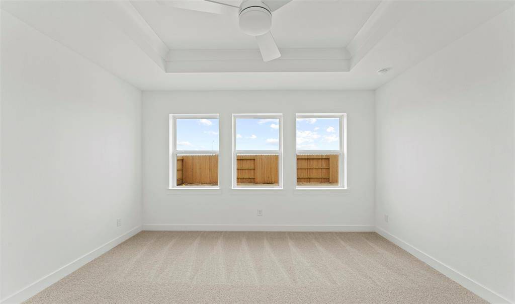 Spacious primary bedroom (*Photo not of actual home and used for illustration purposes only.)